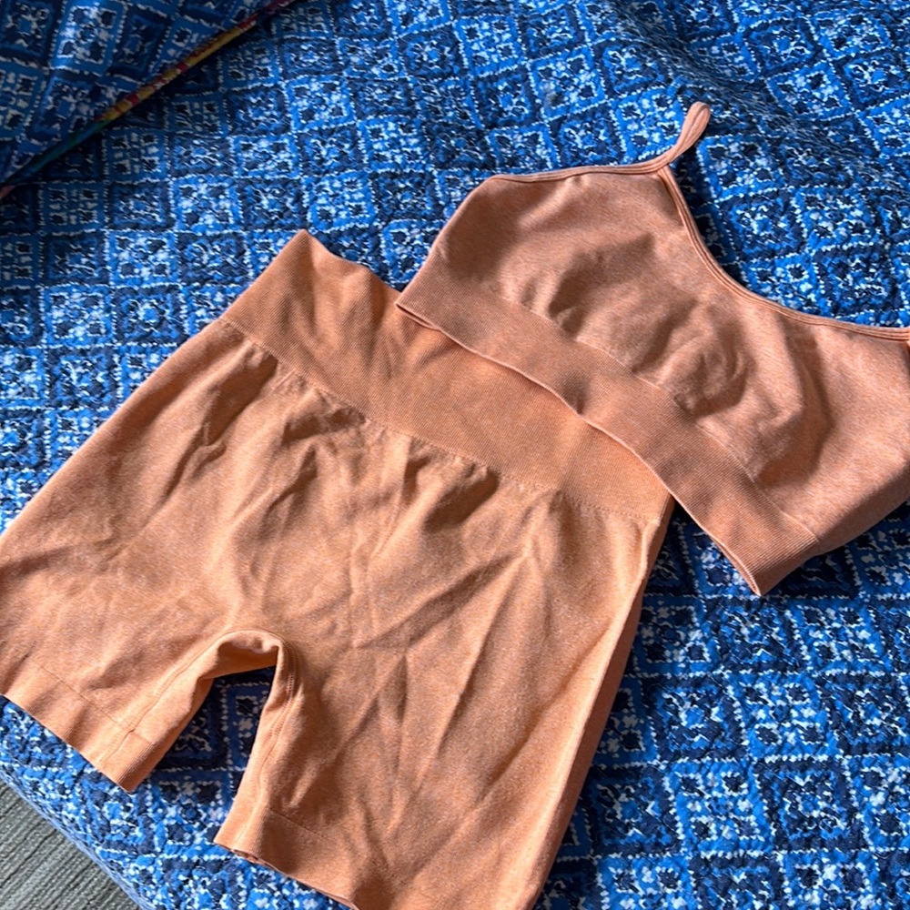 Orange workout set shorts and top